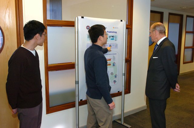 Some Chinese students of the school are educating Prince Philip