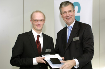 Andrew receiving his award